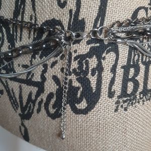 Multi strand chain adjustable belt.  Q4